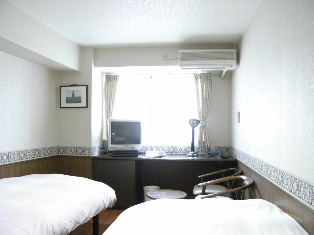 Отель Sunplaza Rinkai Осака Номер фото